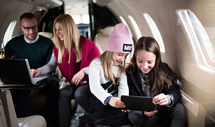 wealthy family on a plane