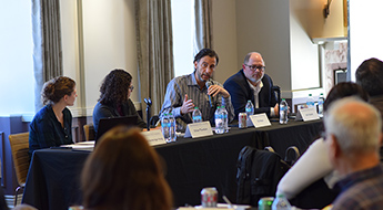 Professor Eli Finkel sits on a panel with other Northwestern faculty