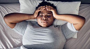 Black woman having trouble sleeping