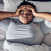 Black woman having trouble sleeping