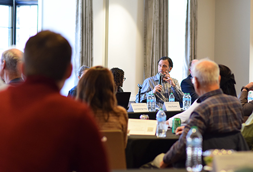 Eli Finkel answers a question on a panel.