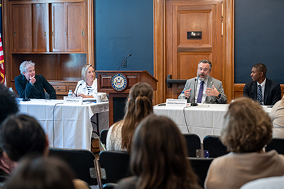 panel with four professors