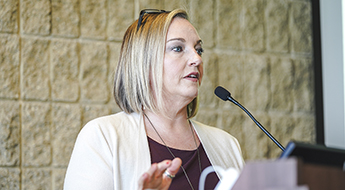 Stefanie DeLuca speaks at Northwestern