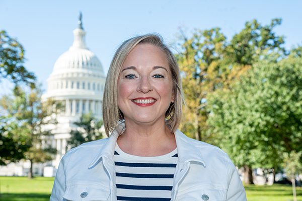 image of DeLuca in front of Capitol building